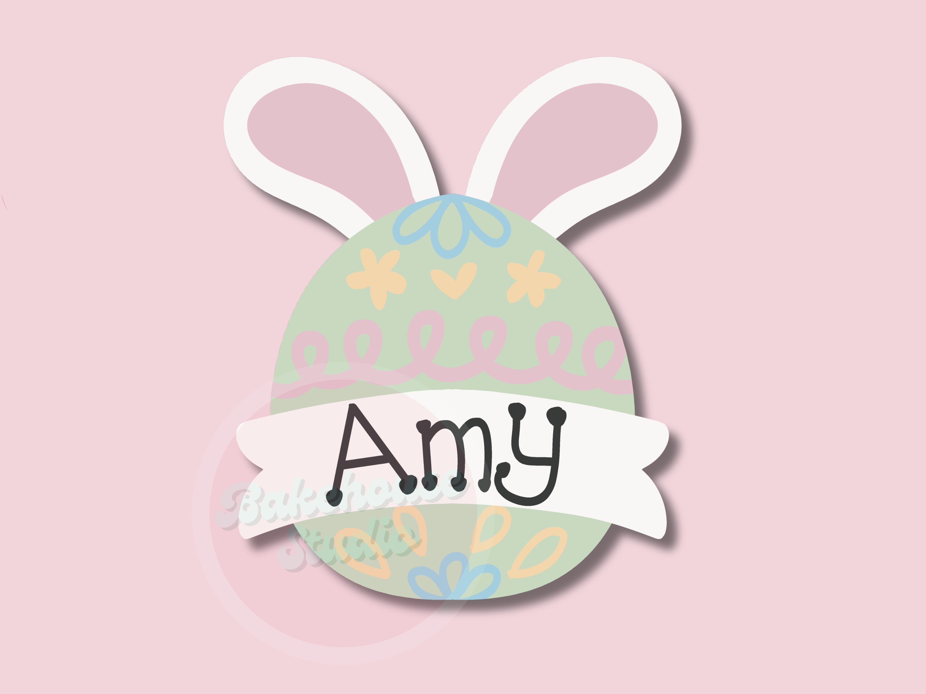 Easter egg-shaped name tag with bunny ears on a pink background